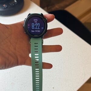 Garmin Forerunner 245 with music. Works great, just upgraded. No box/charger.